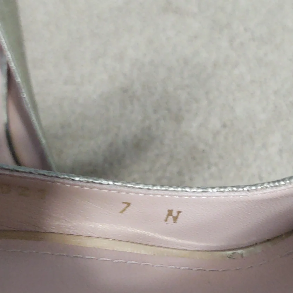 VGUC Stuart Weitzman silver metallic peep toe pumps with wood heels